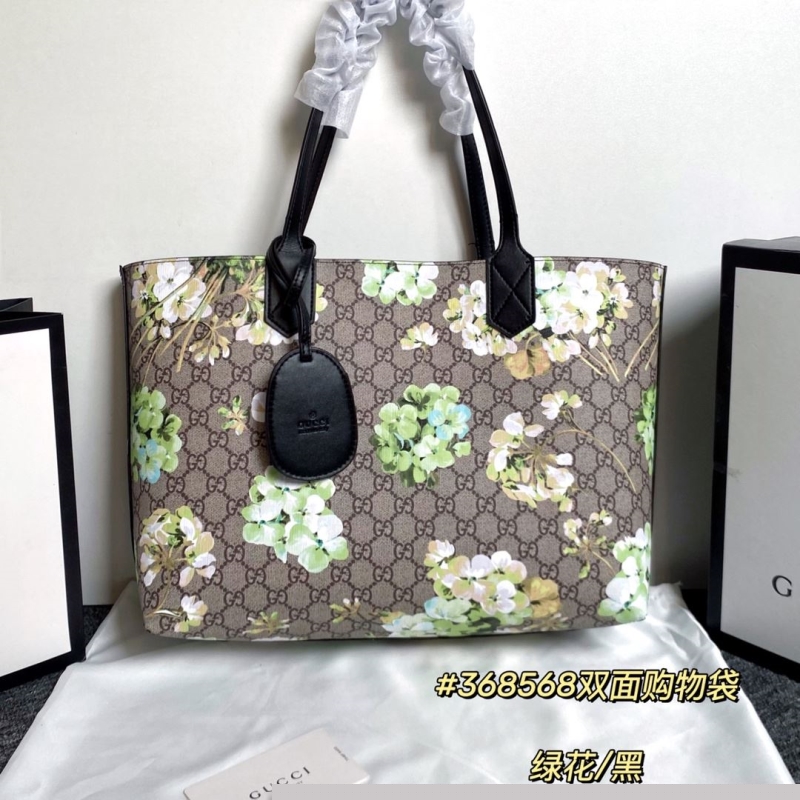 G*u*i shopping bags